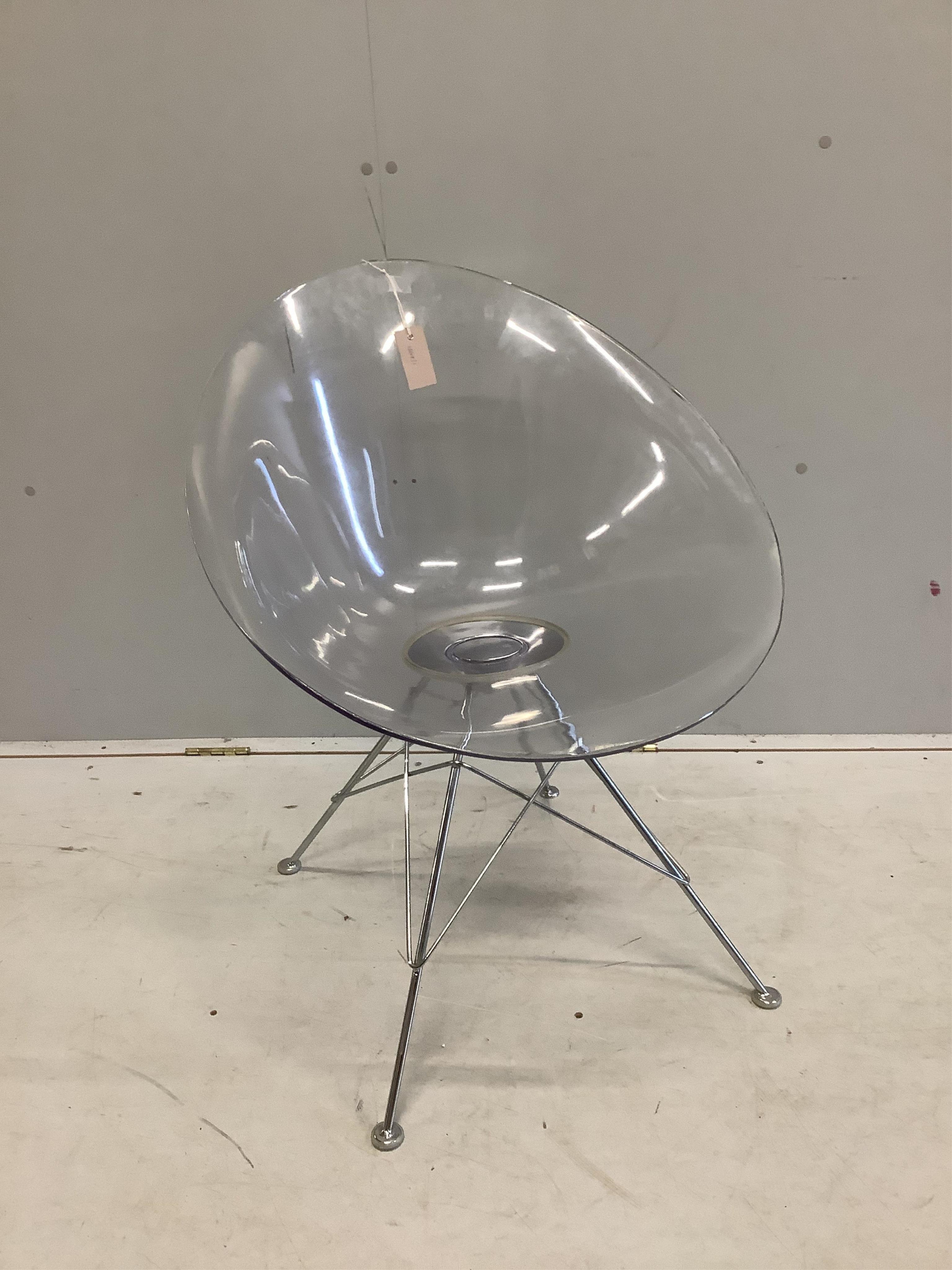 A Philip Starck style Eros transparent chair on “Eiffel Tower” base, width 61cm, depth 60cm, height 81cm. Condition - fair, minor chips and surface scratches.